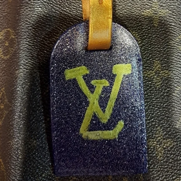 Authentic Louis Vuitton luggage tag repurposed